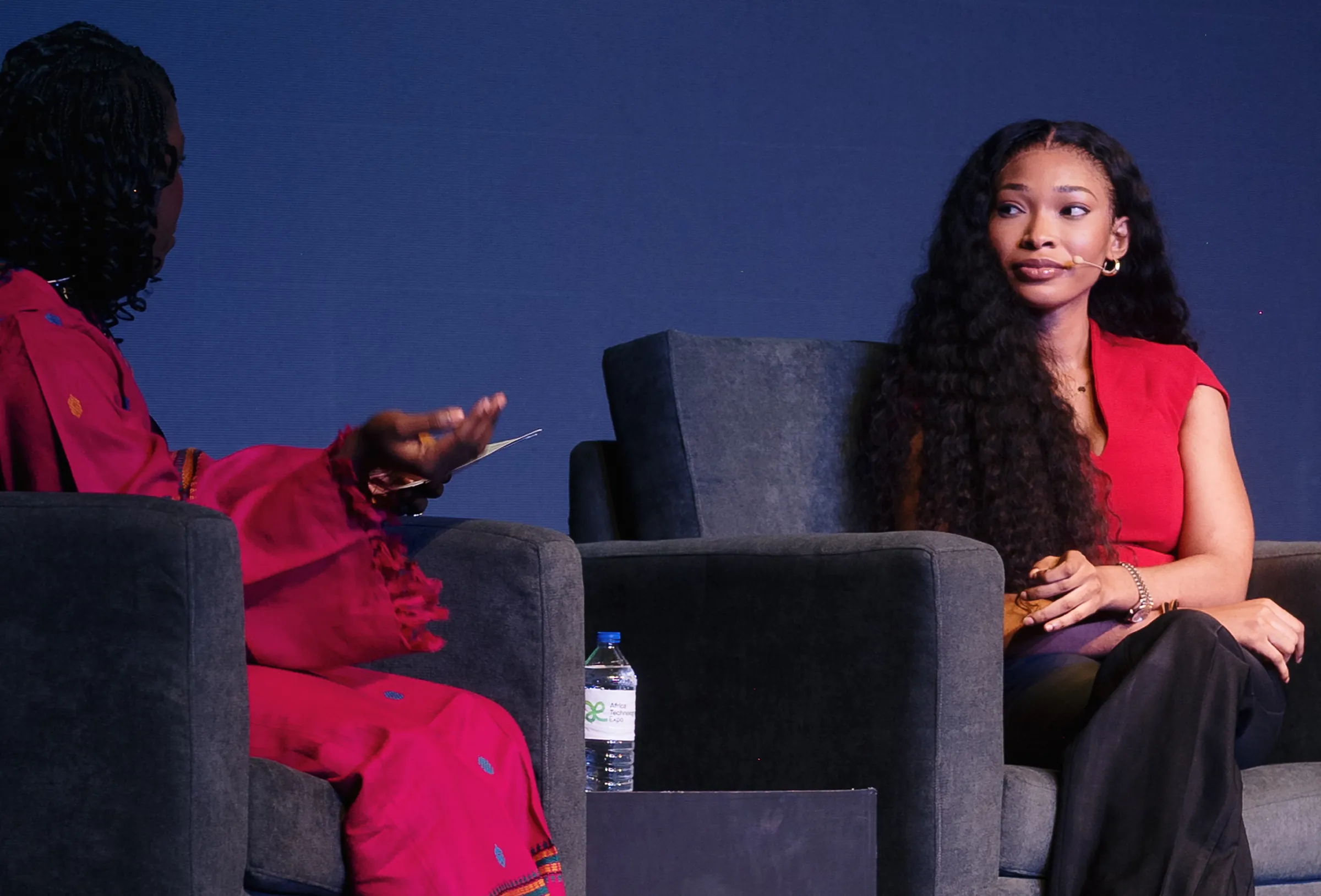 Two business professionals in conversation at a Breet event